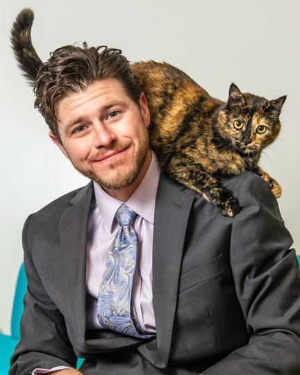 A portrait of owner Matt DuPriest and his cat, Felina